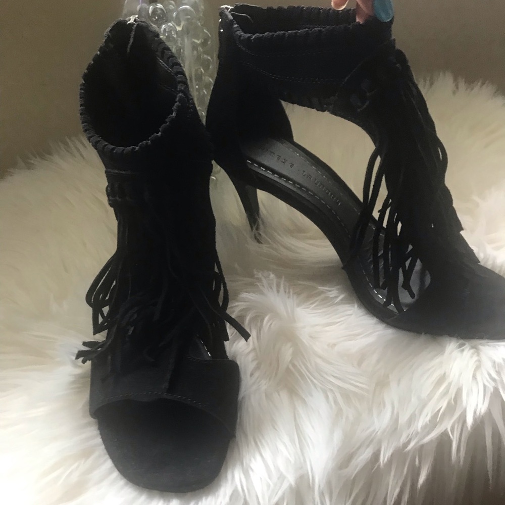 Black suede tasseled heels